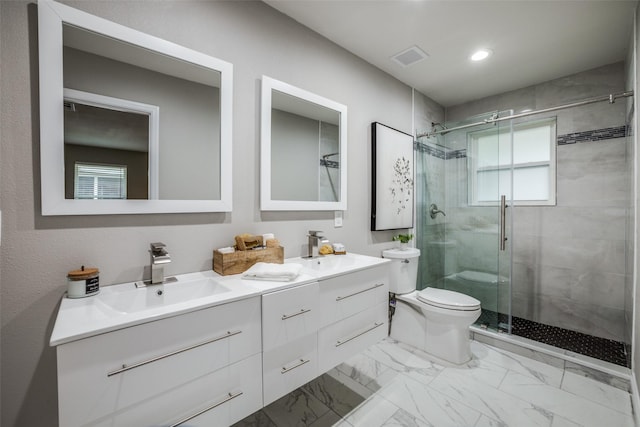 bathroom featuring toilet, walk in shower, and vanity