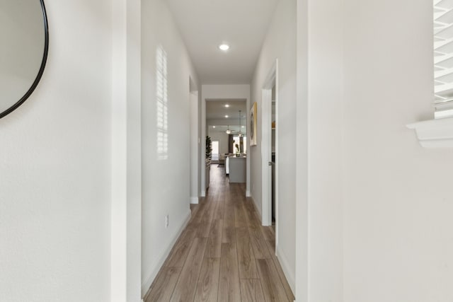 corridor featuring light wood-type flooring