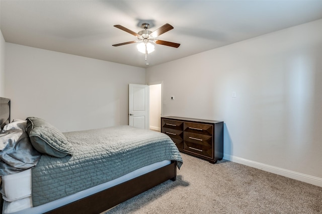 bedroom featuring ceiling fan and light colored carpet