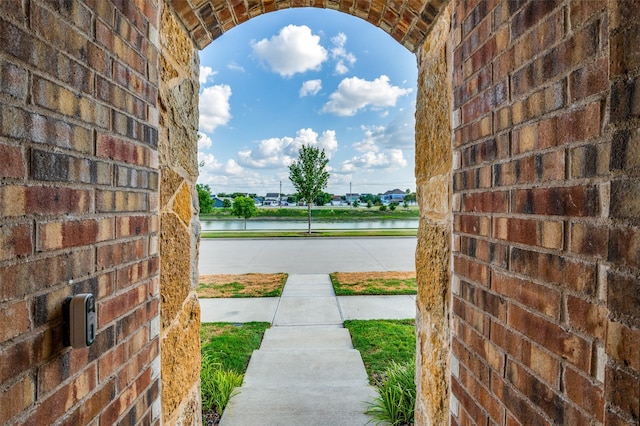 exterior space with a water view