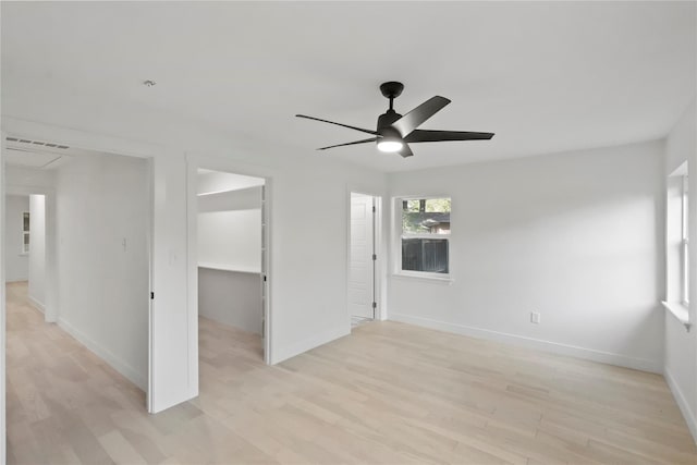 unfurnished room featuring light hardwood / wood-style flooring and ceiling fan