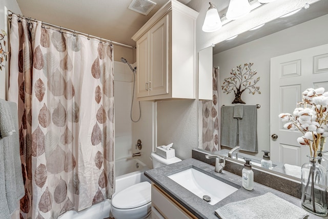 full bathroom with vanity, toilet, and shower / bath combo with shower curtain