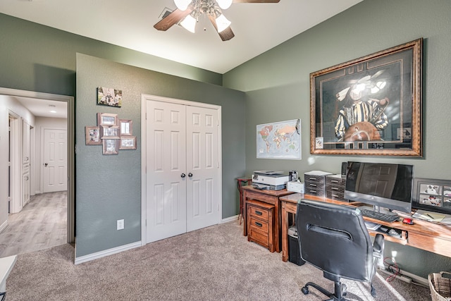 office area with lofted ceiling, light colored carpet, and ceiling fan