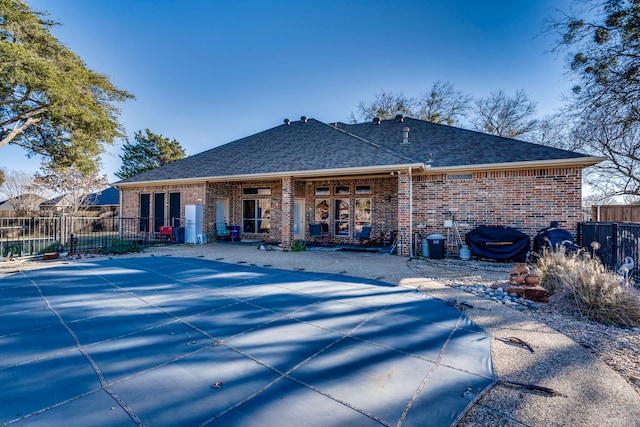 rear view of house featuring a patio