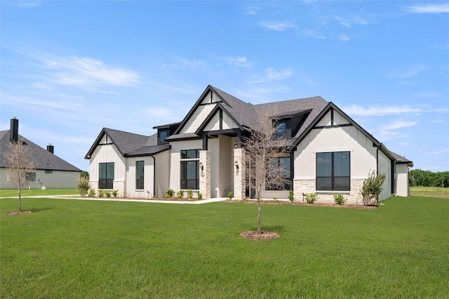 440 Olson Rd, Waxahachie, TX 75167 - view of front of home with stone siding, a front lawn, and a standing seam roof