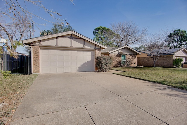 ranch-style home with a garage and a front yard