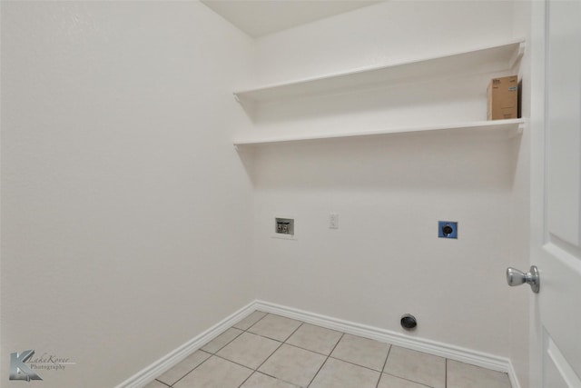 washroom with hookup for a washing machine, electric dryer hookup, and light tile patterned floors