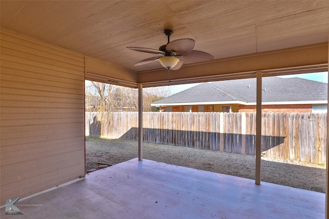 view of patio featuring ceiling fan