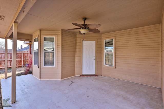 view of patio featuring ceiling fan