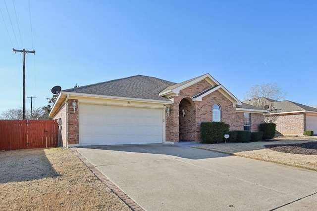 ranch-style home with a garage