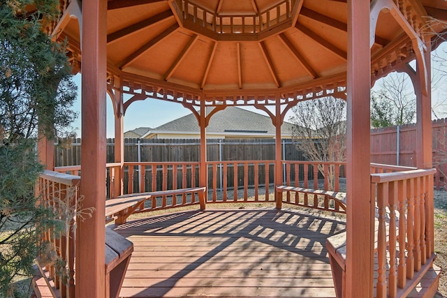 wooden deck featuring a gazebo