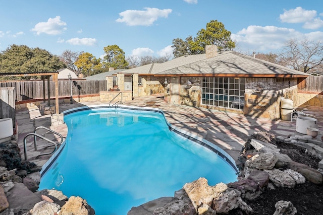 view of pool featuring a patio area