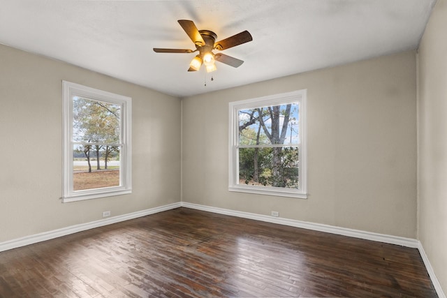 unfurnished room with ceiling fan and dark hardwood / wood-style floors