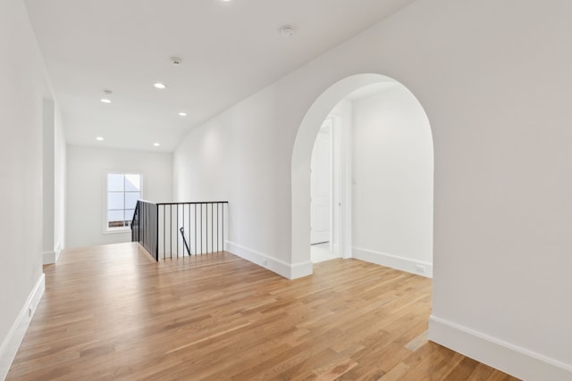 spare room with light wood-type flooring