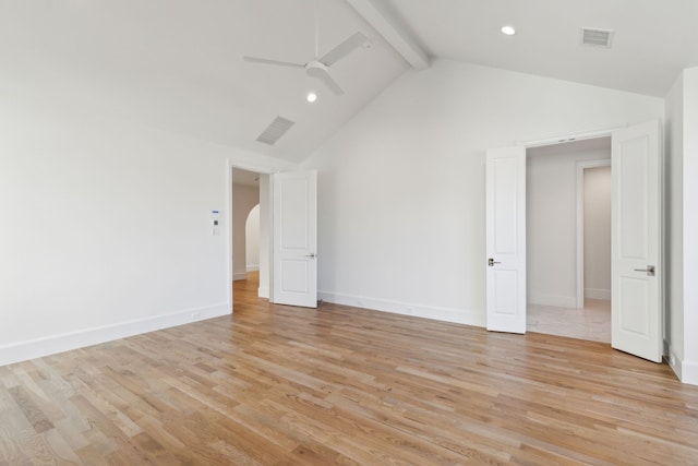 empty room featuring high vaulted ceiling, ceiling fan, light hardwood / wood-style flooring, and beamed ceiling