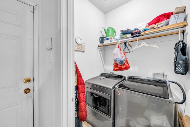 washroom featuring washer and dryer