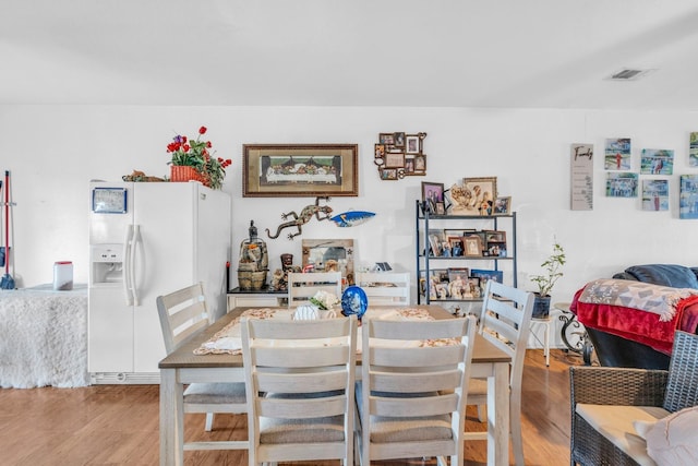 dining area featuring light hardwood / wood-style floors