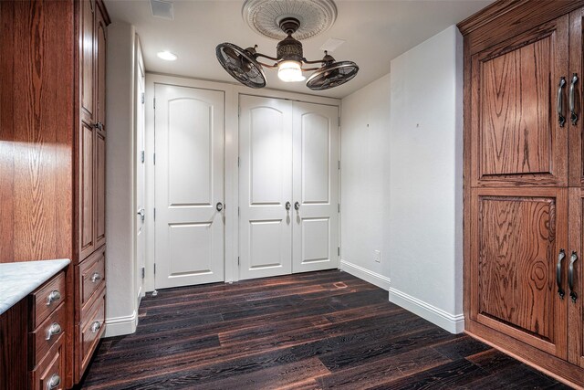 interior space with dark wood-type flooring