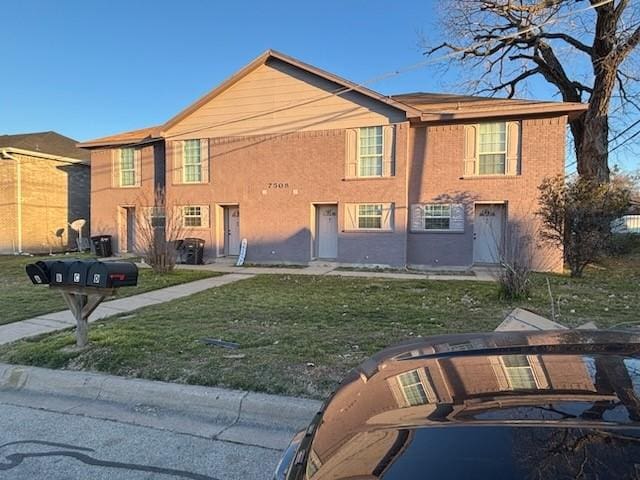 exterior space with a front lawn