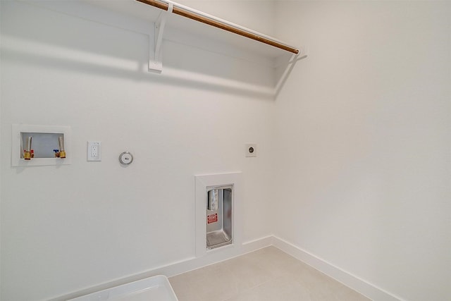 laundry area featuring hookup for a washing machine, electric dryer hookup, and hookup for a gas dryer