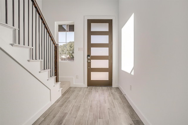 foyer with light wood-type flooring