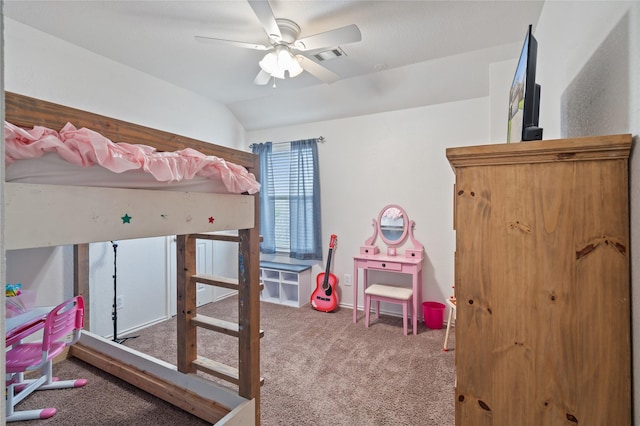 carpeted bedroom with lofted ceiling and ceiling fan