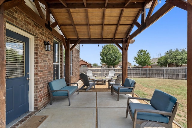 view of patio / terrace with a fire pit