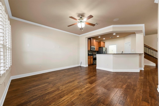 kitchen with ornamental molding, dark hardwood / wood-style flooring, ceiling fan, and appliances with stainless steel finishes