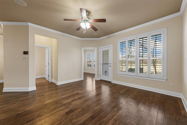 unfurnished living room with crown molding, dark wood-type flooring, and ceiling fan