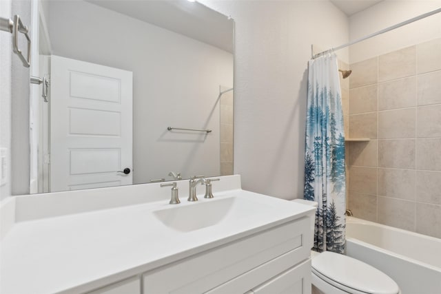 full bathroom featuring vanity, toilet, and shower / bath combo