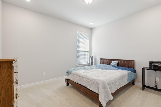 bedroom with light carpet