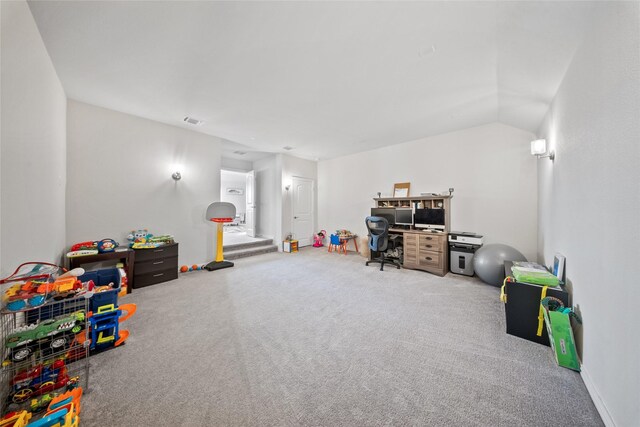 rec room with vaulted ceiling and carpet floors