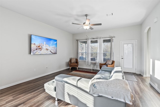 interior space featuring wood-type flooring and ceiling fan