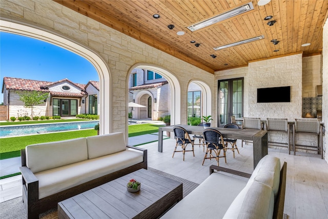 view of patio with a pool and an outdoor hangout area