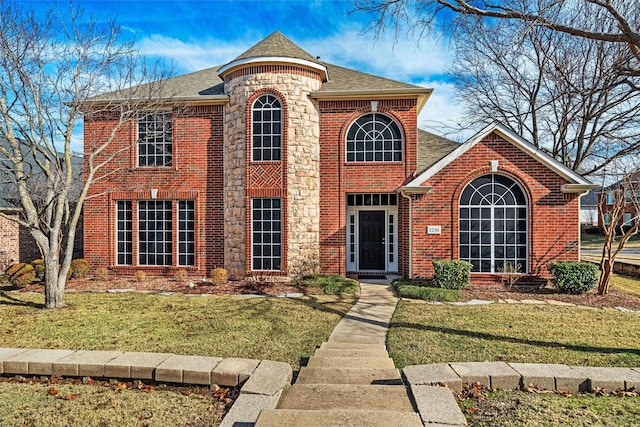 view of front of property with a front lawn