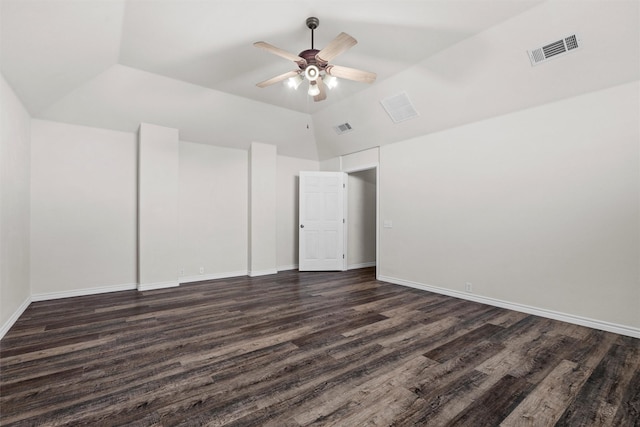 unfurnished room with ceiling fan, vaulted ceiling, and dark wood-type flooring