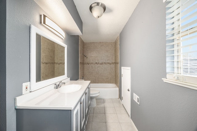 full bath featuring shower / washtub combination, tile patterned flooring, vanity, and toilet