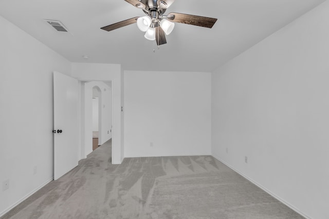 carpeted empty room with ceiling fan