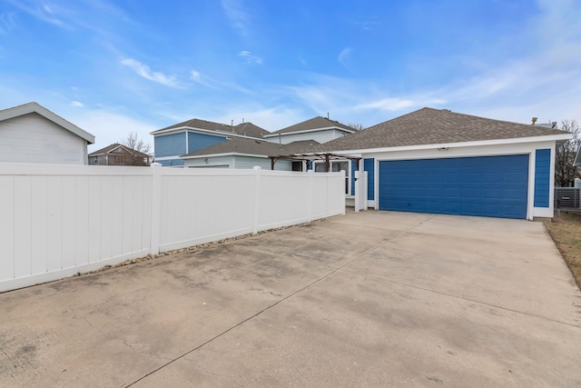 exterior space with a garage