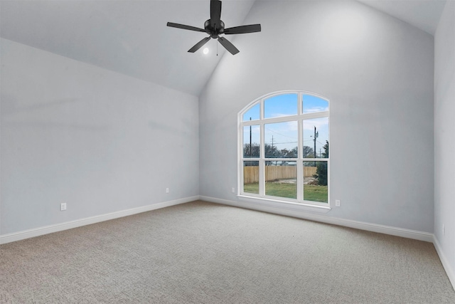 unfurnished room with high vaulted ceiling, carpet floors, and ceiling fan