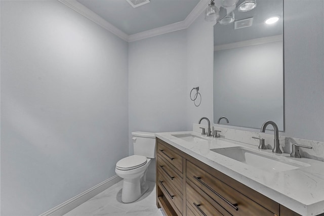 bathroom featuring toilet, vanity, and crown molding