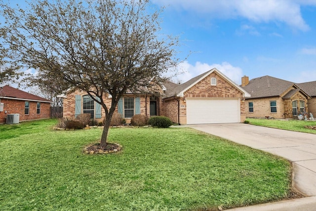 ranch-style home with a garage, a front lawn, and central AC unit