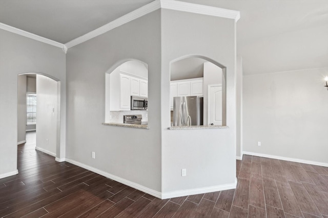 empty room featuring ornamental molding