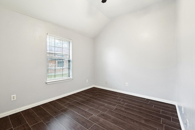 spare room with ceiling fan and lofted ceiling