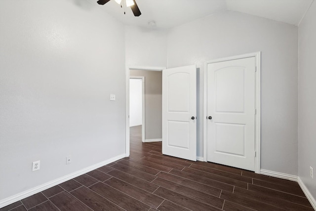 unfurnished bedroom featuring lofted ceiling and ceiling fan