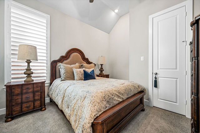 bedroom featuring light carpet, ceiling fan, and lofted ceiling