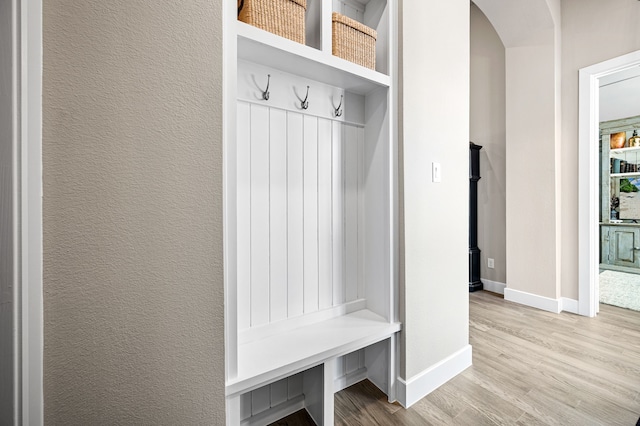 mudroom featuring wood-type flooring