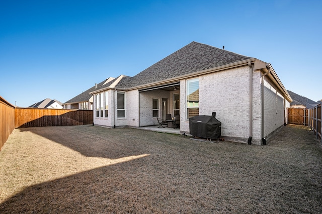 rear view of property with a patio