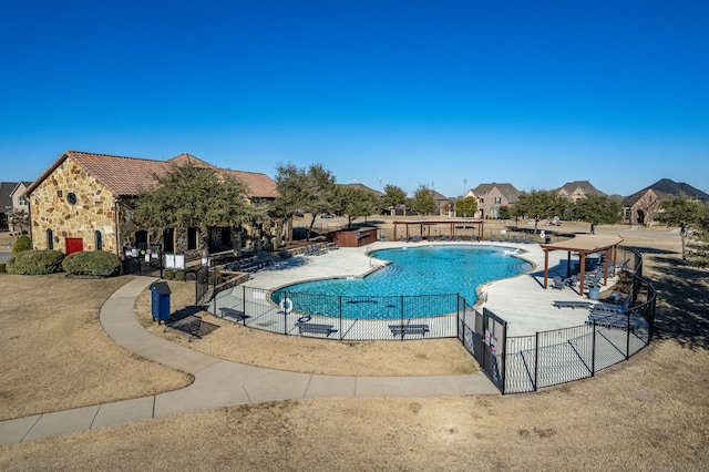 view of swimming pool with a mountain view and a patio