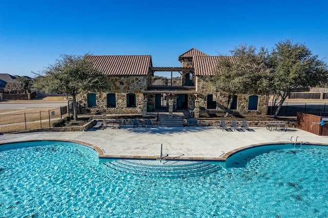 view of pool with a patio area